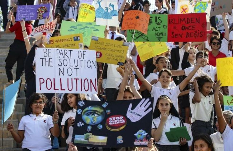 Thousands of Turkish students, holding banners and posters take part in the global climate strike held to draw the attention of global climate change, on September 20, 2019 in Ankara, Turkey. (Photo: Esra Hacioglu/Anadolu Agency/Getty Images)