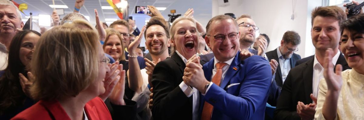 Tino Chrupalla and Alice Weidel of the far-right Alternative for Germany (AfD) political party celebrate