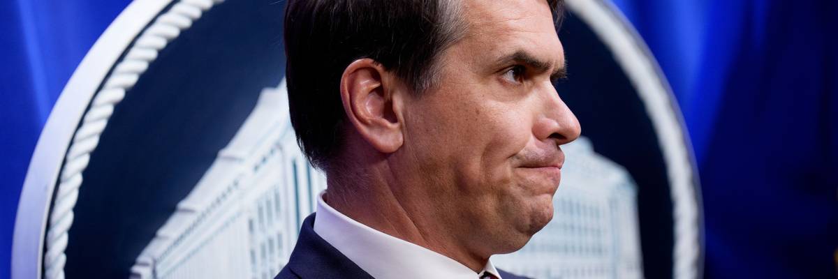 Todd Blanche is shown in profile.
