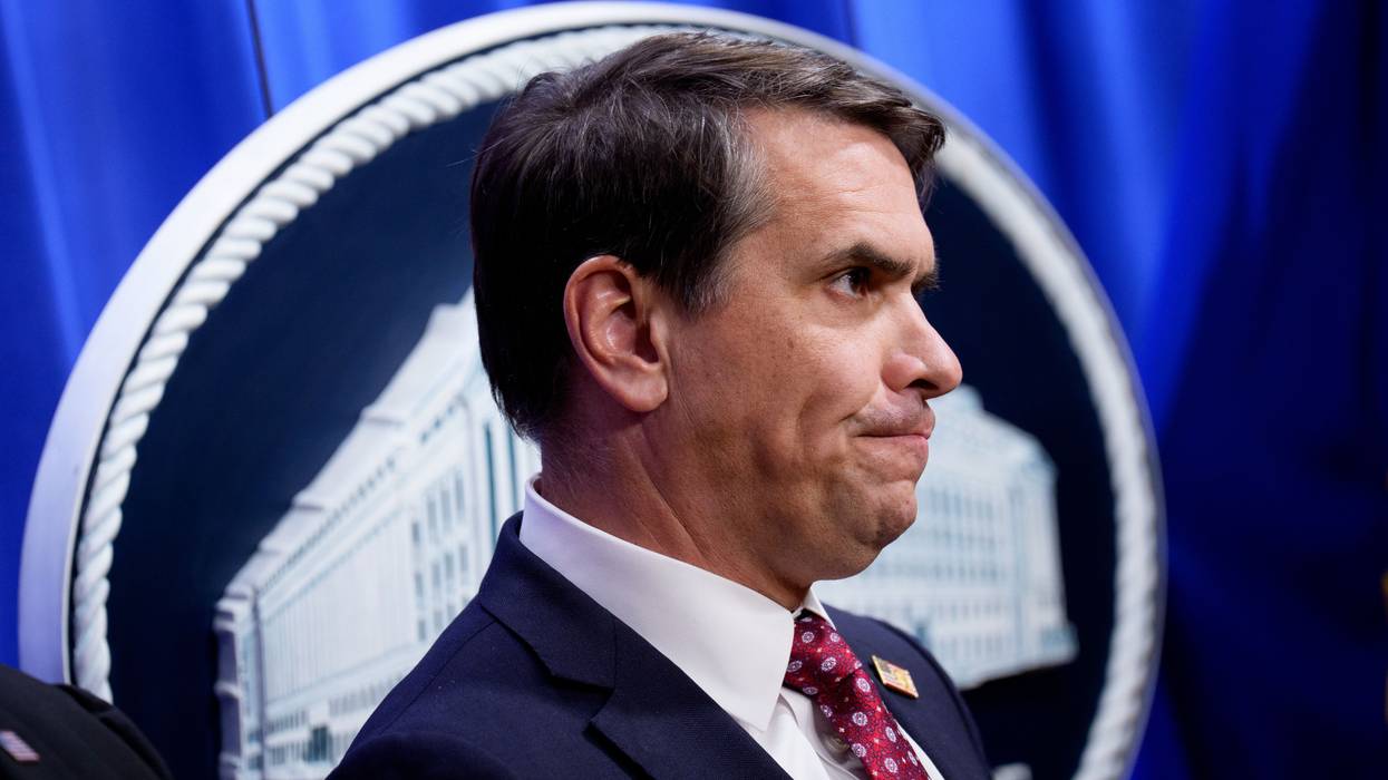 Todd Blanche is shown in profile.