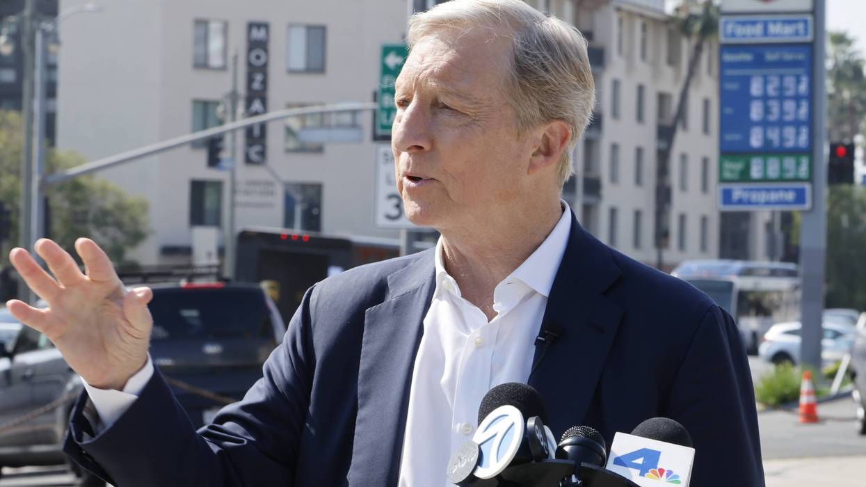 Tom Steyer campaigns in front of a gas station selling gasoline for over $8/gallon