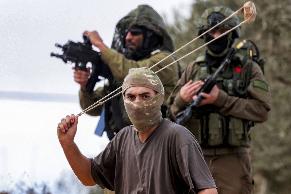 TOPSHOT-PALESTINIAN-ISRAEL-CONFLICT-WEST BANK-SETTLERS