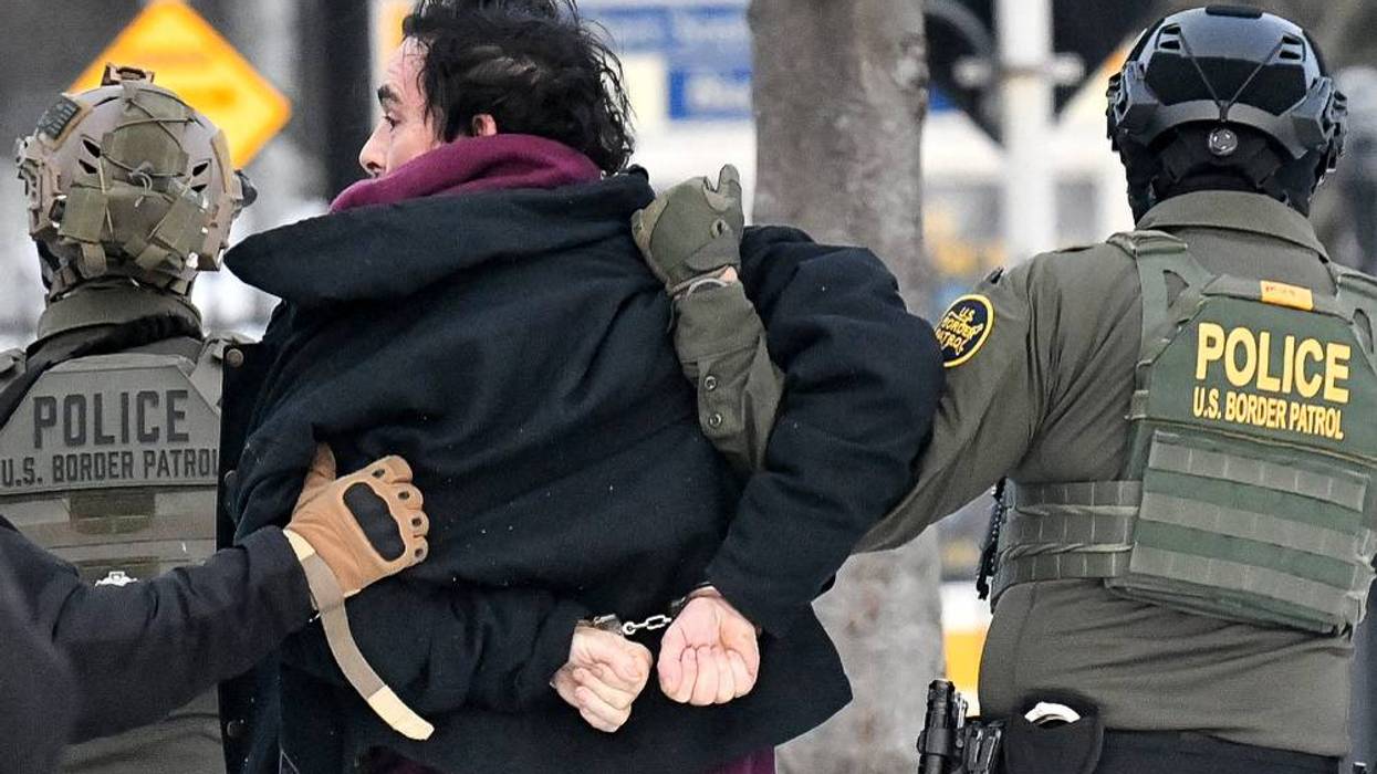 TOPSHOT-US-IMMIGRATION-ICE-SHOOTING