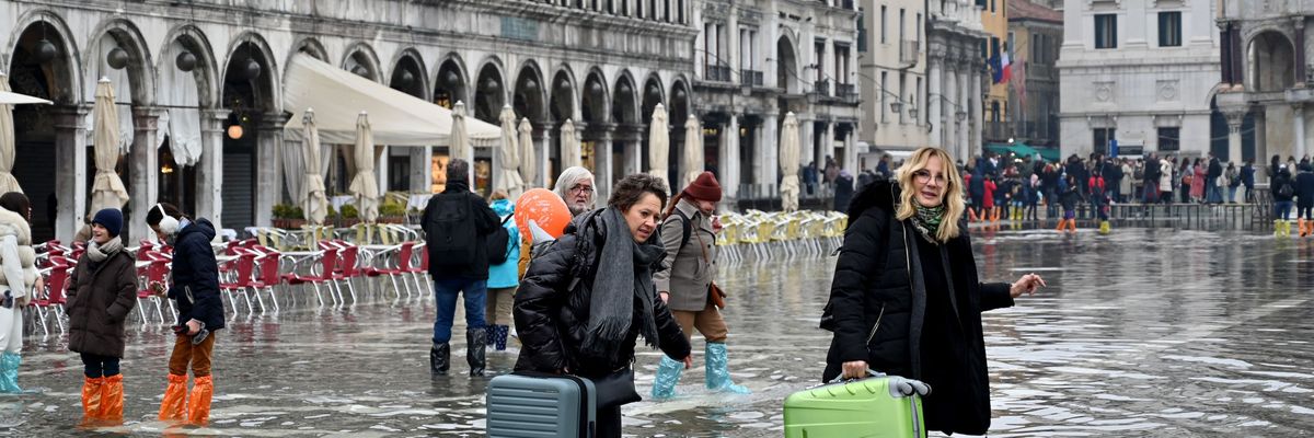 Tourists in flooded Venice