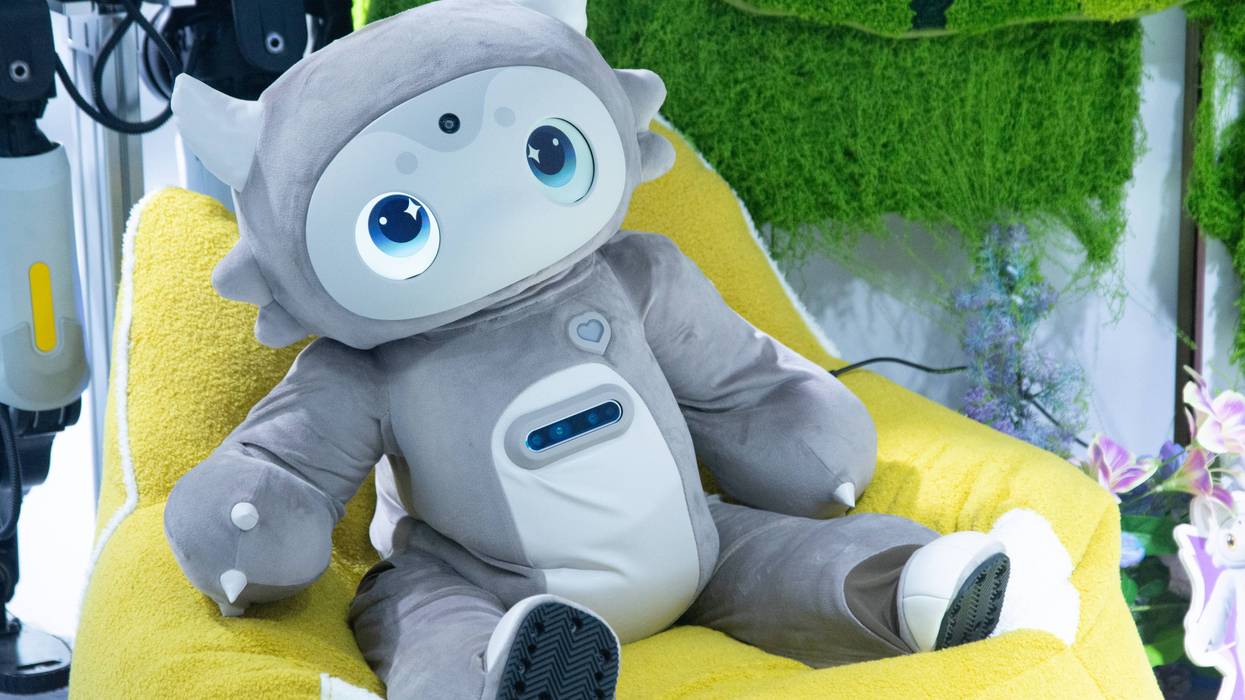 Toy robot on display at trade fair.