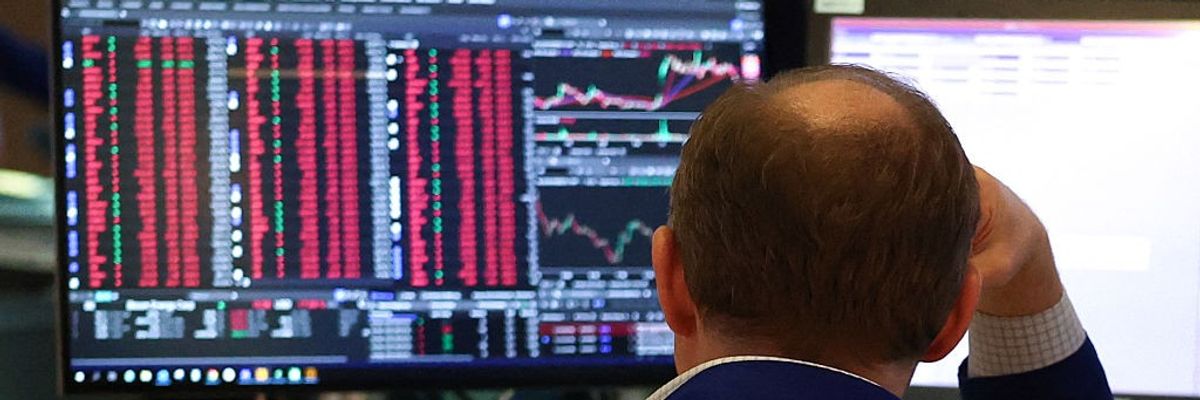 Trader watches stocks plummet
