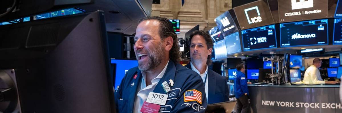 Traders on floor of stock exchange