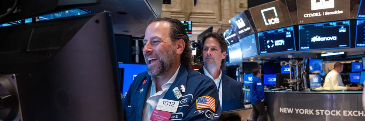 Traders on floor of stock exchange