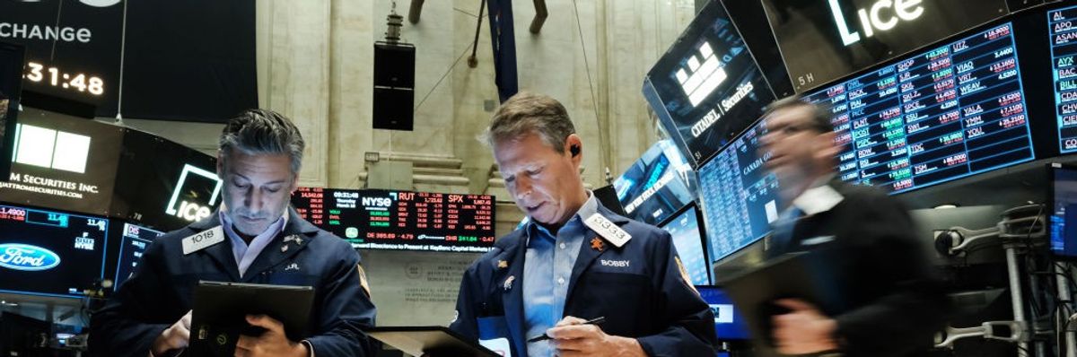 Traders work on the floor of the New York Stock Exchange (NYSE) on March 16, 2023