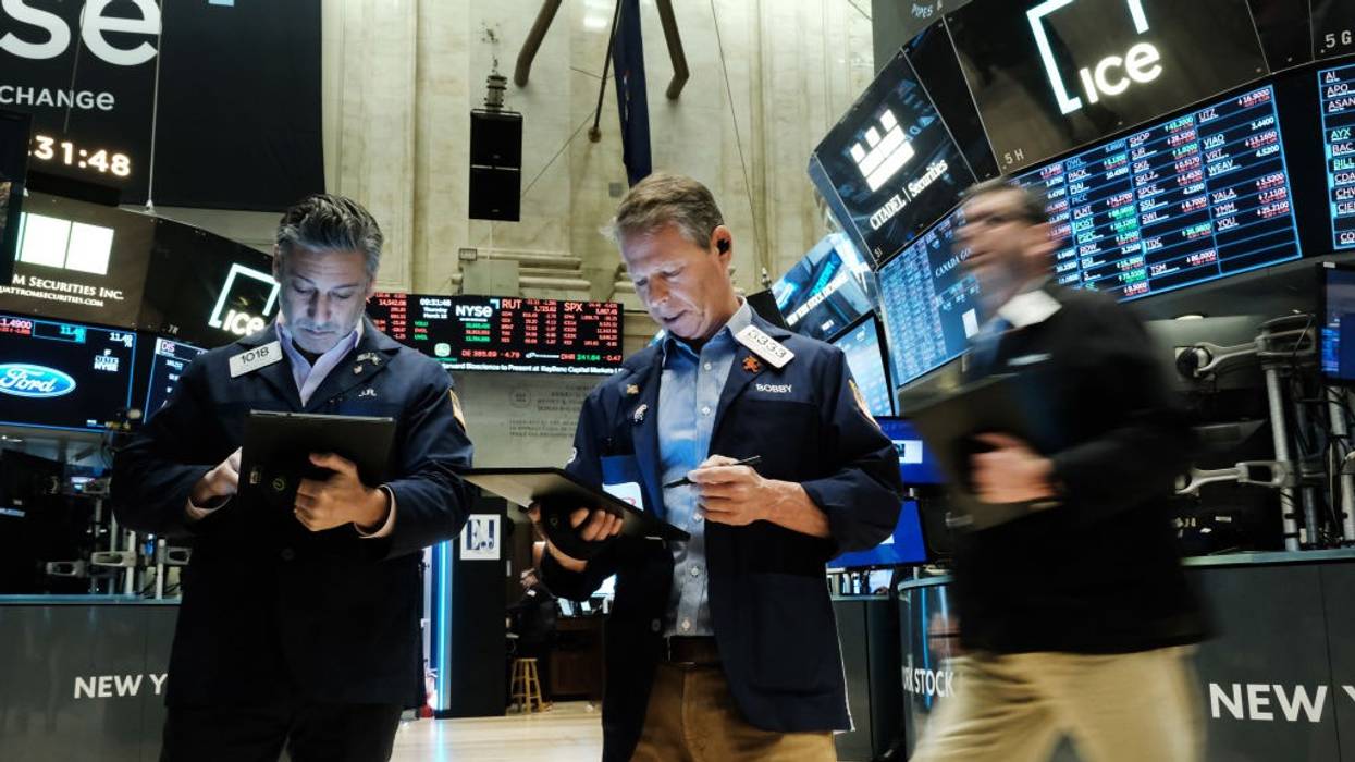 Traders work on the floor of the New York Stock Exchange (NYSE) on March 16, 2023