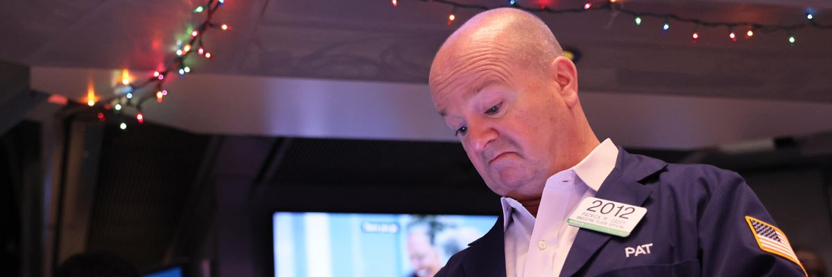 Traders work on the floor of the New York Stock Exchange
