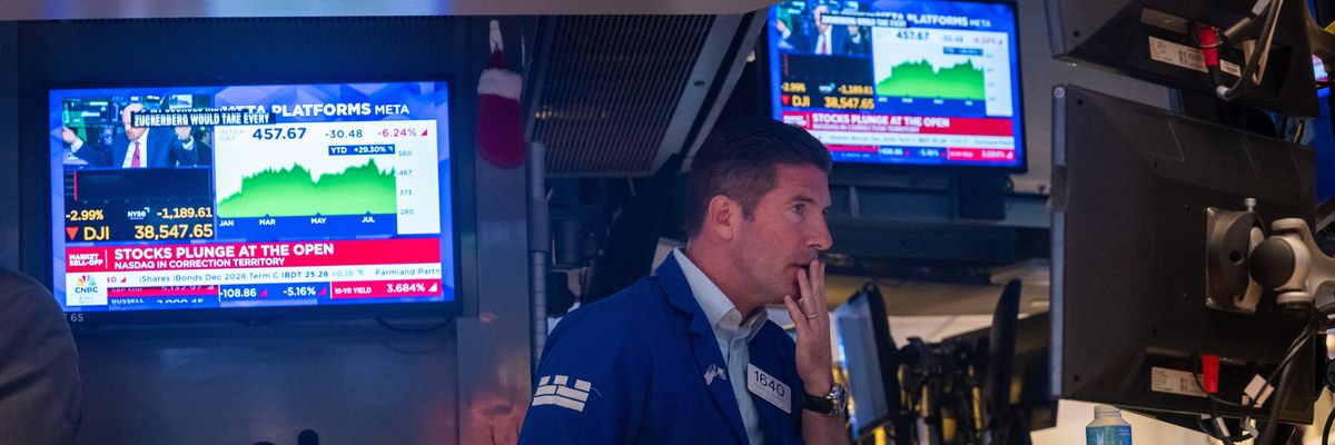 Traders work on the floor of the New York Stock Exchange