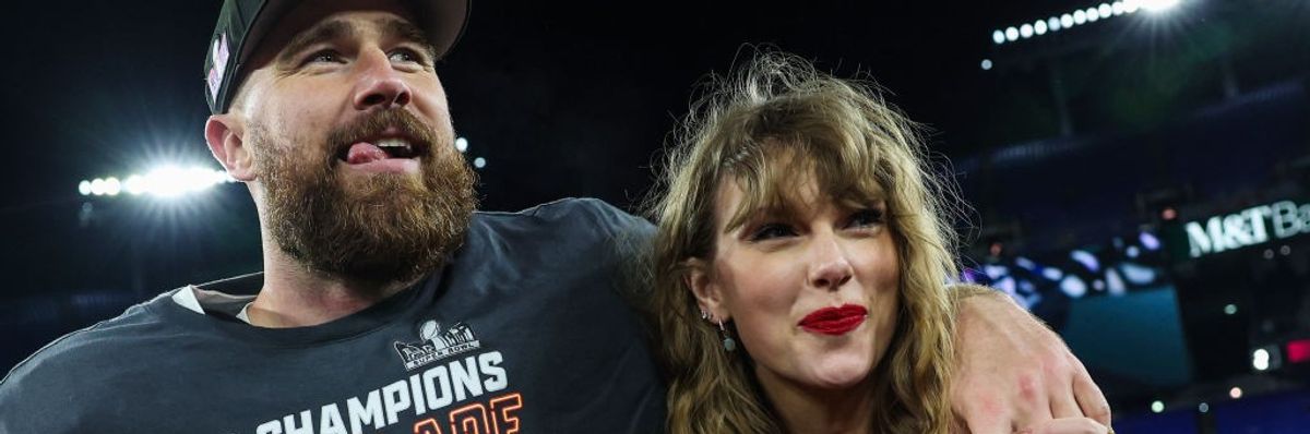 Travis Kelce celebrates with Taylor Swift