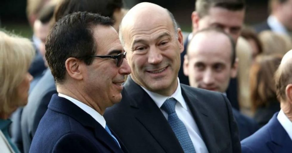 Treasury Secretary Steve Mnuchin and White House National Economic Council Director Gary Cohn attend an event to celebrate Congress passing the Tax Cuts and Jobs Act with Republican members of the House and Senate on the South Lawn of the White House December 20, 2017 in Washington, D.C. (Photo: Chip Somodevilla/Getty Images)