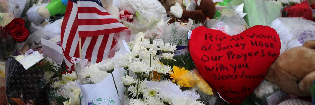 Tributes to the victims left at the shrine set up around the towns Christmas tree in Sandy Hook after the mass shootings at Sandy Hook Elementary School, Newtown, Connecticut on December 17, 2012.