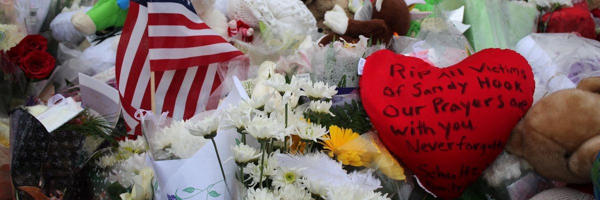 Tributes to the victims left at the shrine set up around the towns Christmas tree in Sandy Hook after the mass shootings at Sandy Hook Elementary School, Newtown, Connecticut on December 17, 2012.