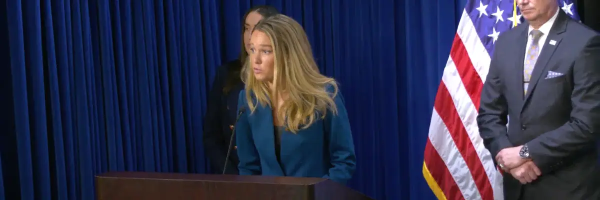 Tricia McLaughlin at a podium