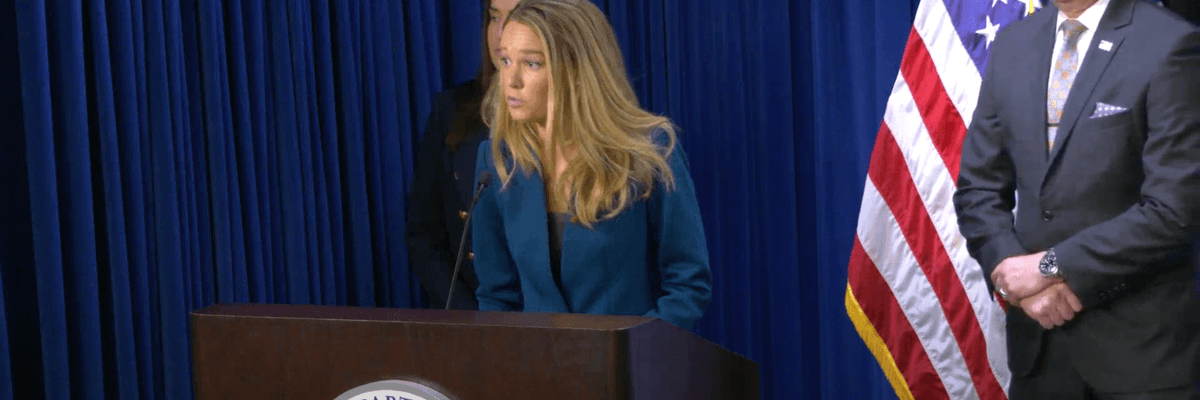 Tricia McLaughlin at a podium