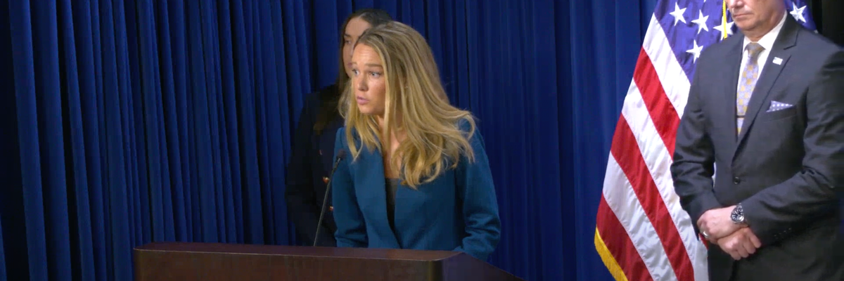 Tricia McLaughlin at a podium