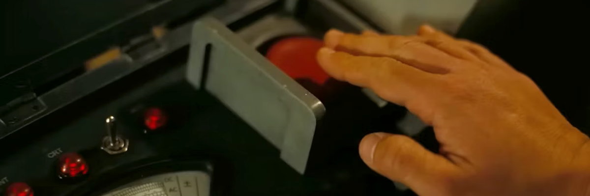 Trinity Test moment of pushing the button in Oppenheimer