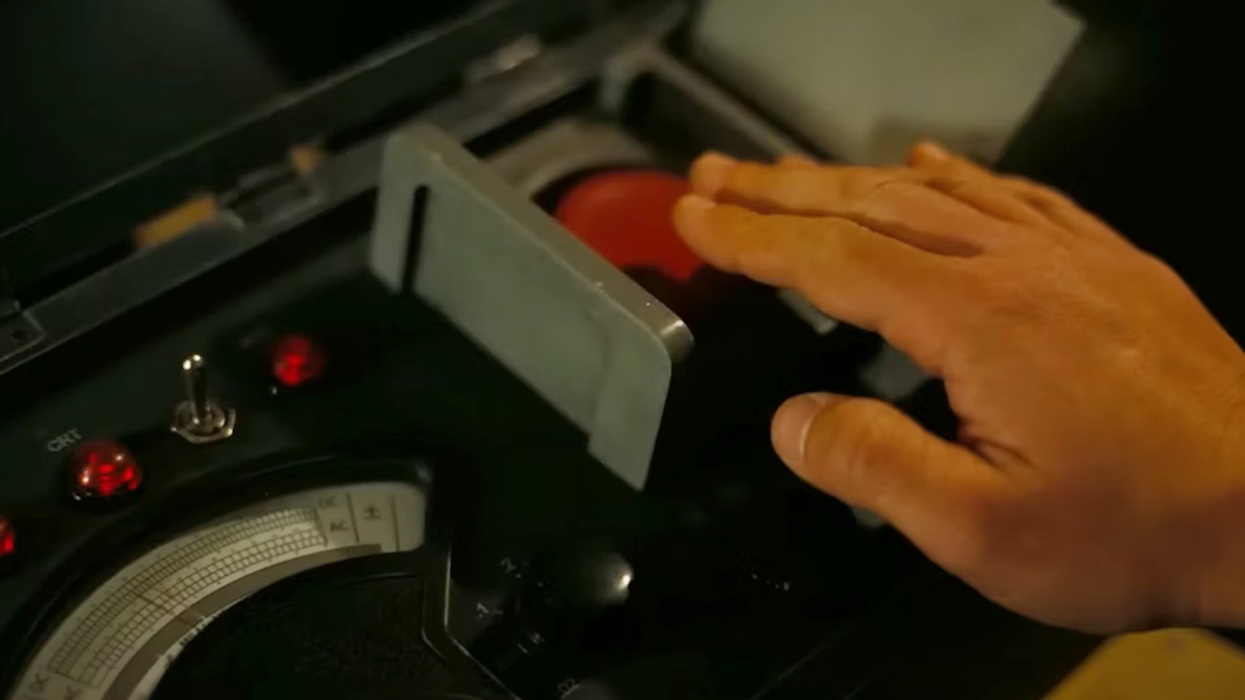 Trinity Test moment of pushing the button in Oppenheimer