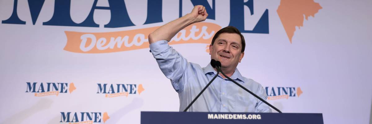 Troy Jackson pumps his fist in the air after being nominated for US Senate