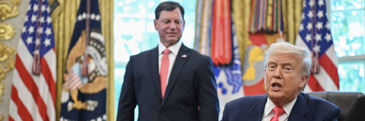 Trump and Bisignano in the Oval Office.