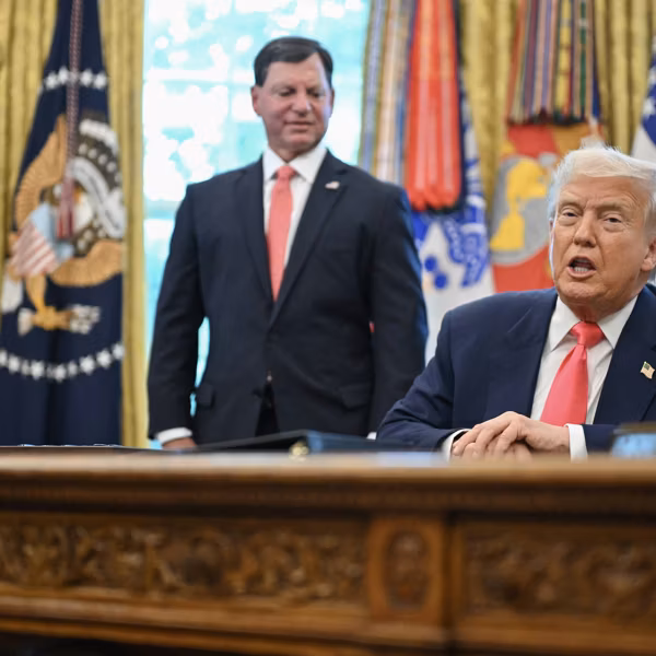 Trump and Bisignano in the Oval Office.