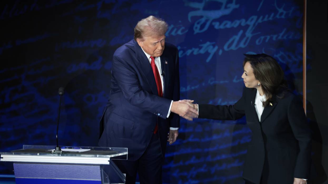 Trump and Harris shake hands before debating.