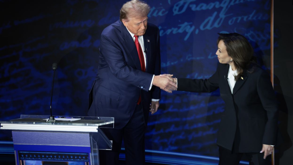 Trump and Harris shake hands before debating.