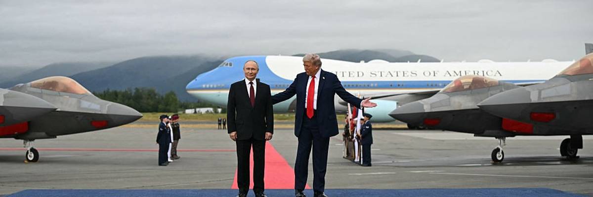 Trump and Putin on a podium.