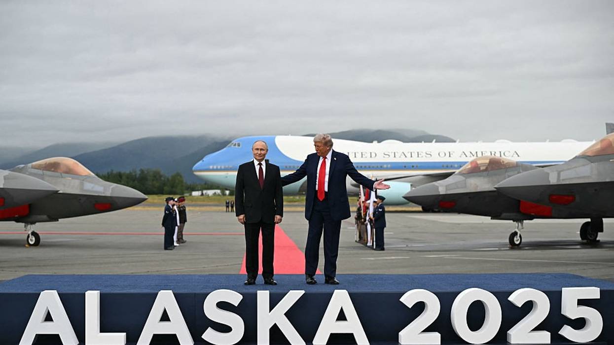 Trump and Putin on a tarmac in Alaska.