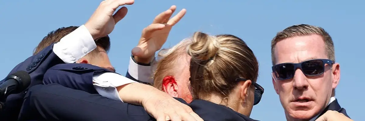 Trump bloodied by shooter