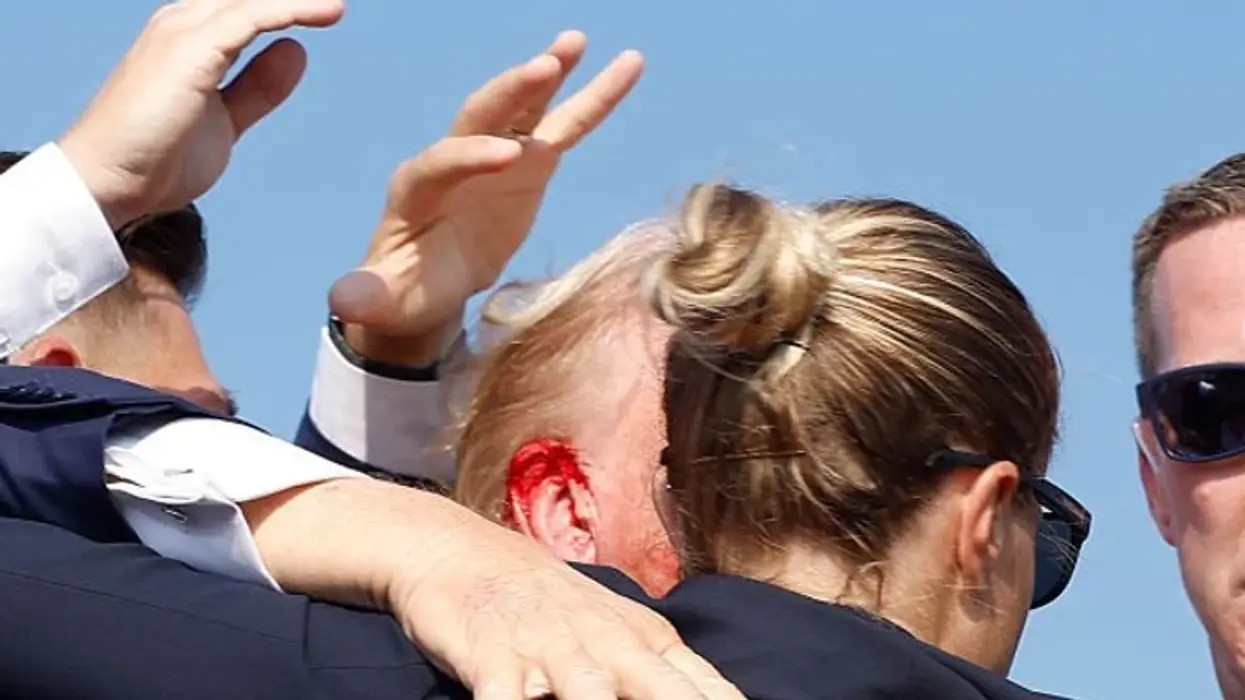 Trump bloodied by shooter