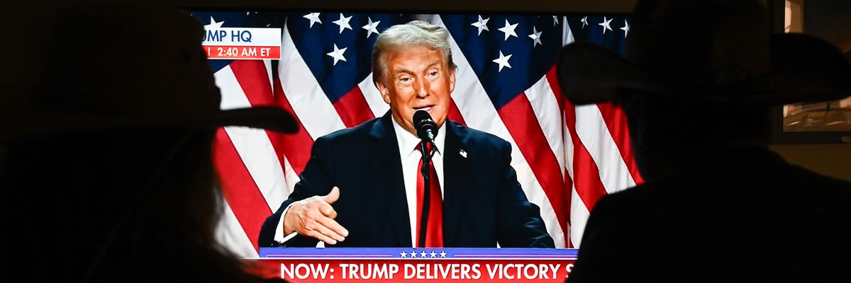 Trump gives victory speech on TV.