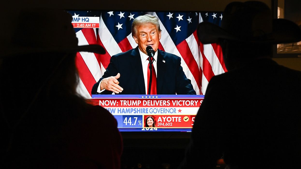 Trump gives victory speech on TV.