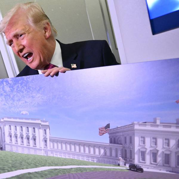Trump holds a rendering of his East Wing remodel.