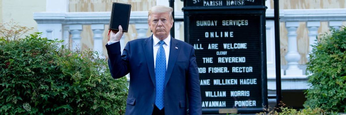 Trump holds Bible in front of a church.