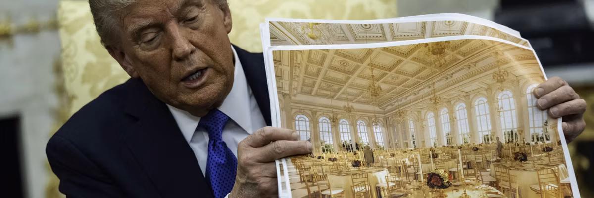 Trump holds photos showing what the White House ballroom will look like