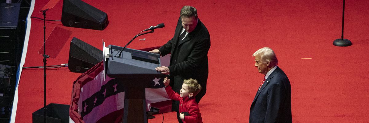 Trump, Musk, and Musk's son at a Trump victory rally.