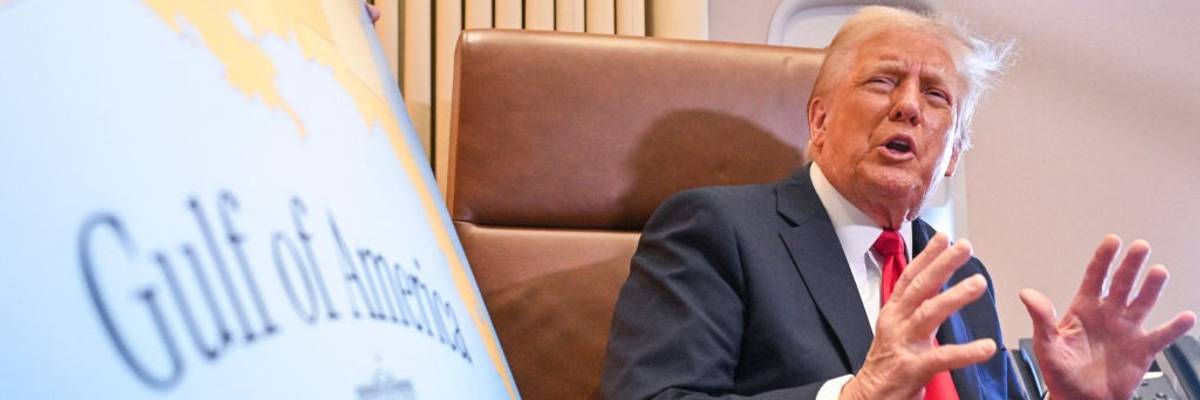 Trump next to 'Gulf of America' sign