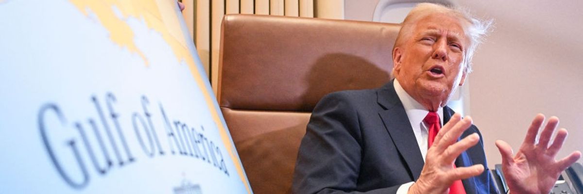 Trump next to 'Gulf of America' sign