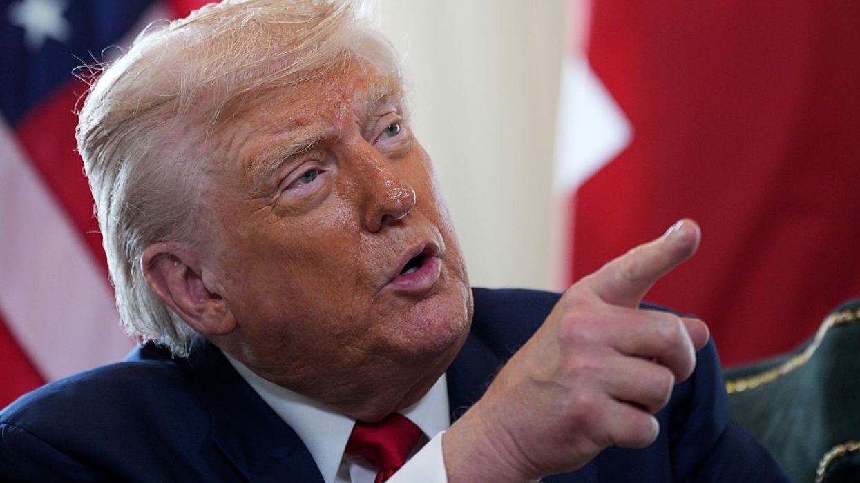 Trump points while speaking.