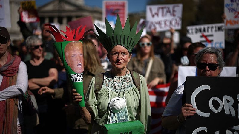 Trump protester as Statue of Liberty