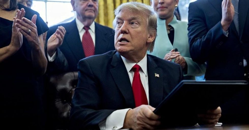 Trump's executive order--which largely flew under the radar of national news coverage--makes official his announcement earlier this year that he would cancel a scheduled 2.1 percent pay raise for millions of non-military federal workers. (Photo: Getty Images)