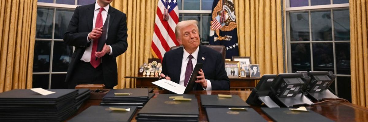 Trump signs executive orders in the Oval Office
