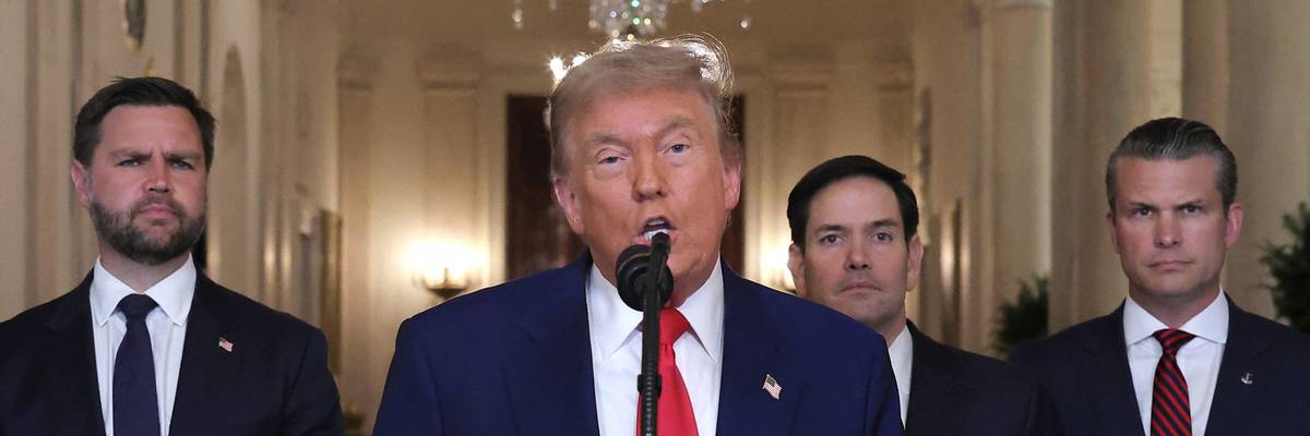 Trump speaks flanked by Vance, Rubio, and Hegseth.