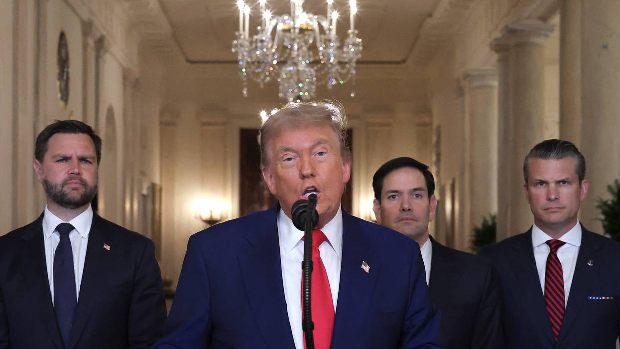 Trump speaks flanked by Vance, Rubio, and Hegseth.