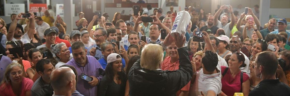 Trump throwing paper towels