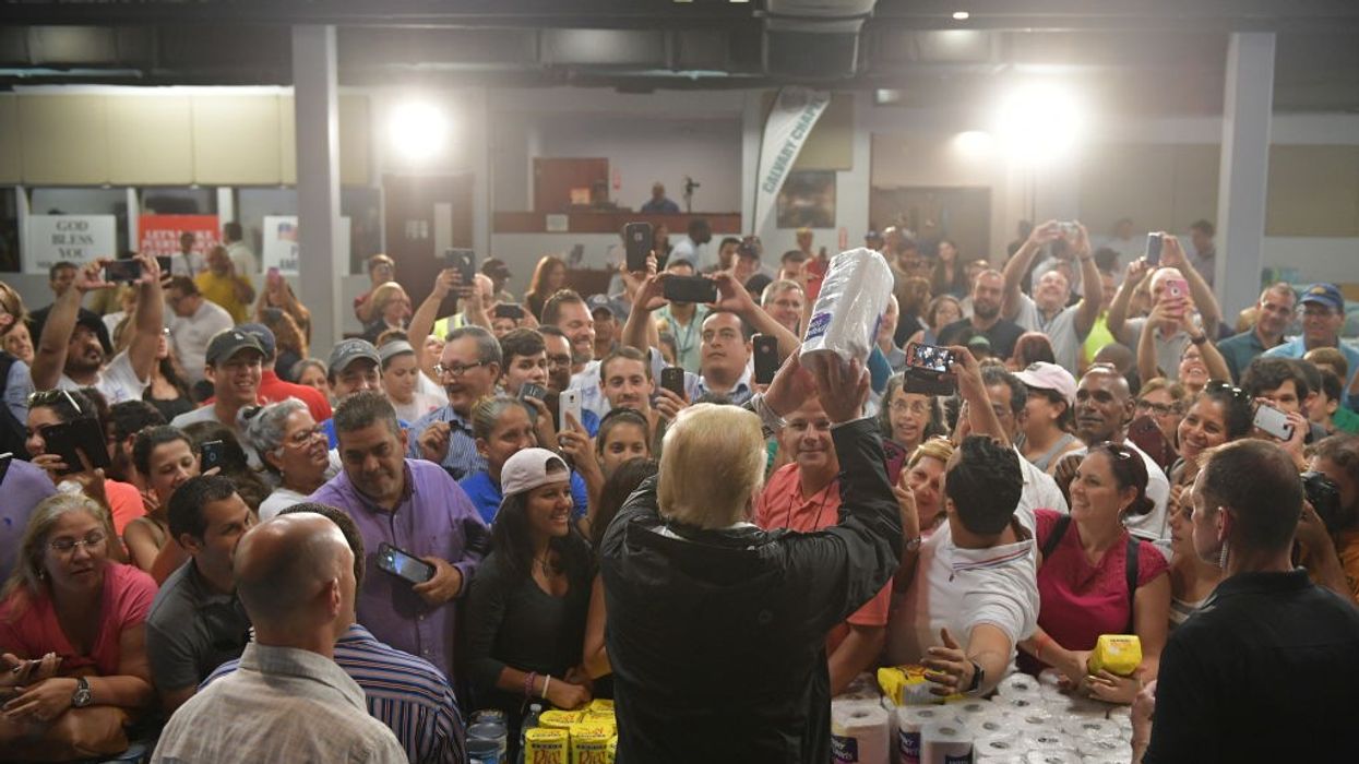 Trump throwing paper towels